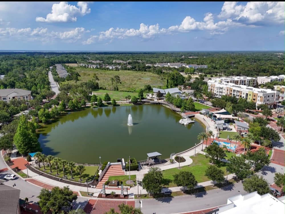 Aerial view of the lake and fountain at Oviedo on the Park